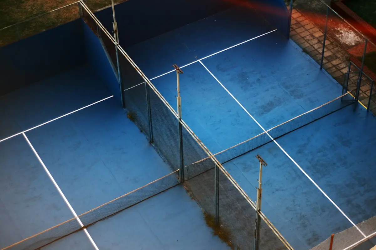 Court seen through the mesh fence